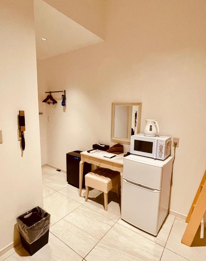 Phoenix Park Hotel Наго Екстериор снимка