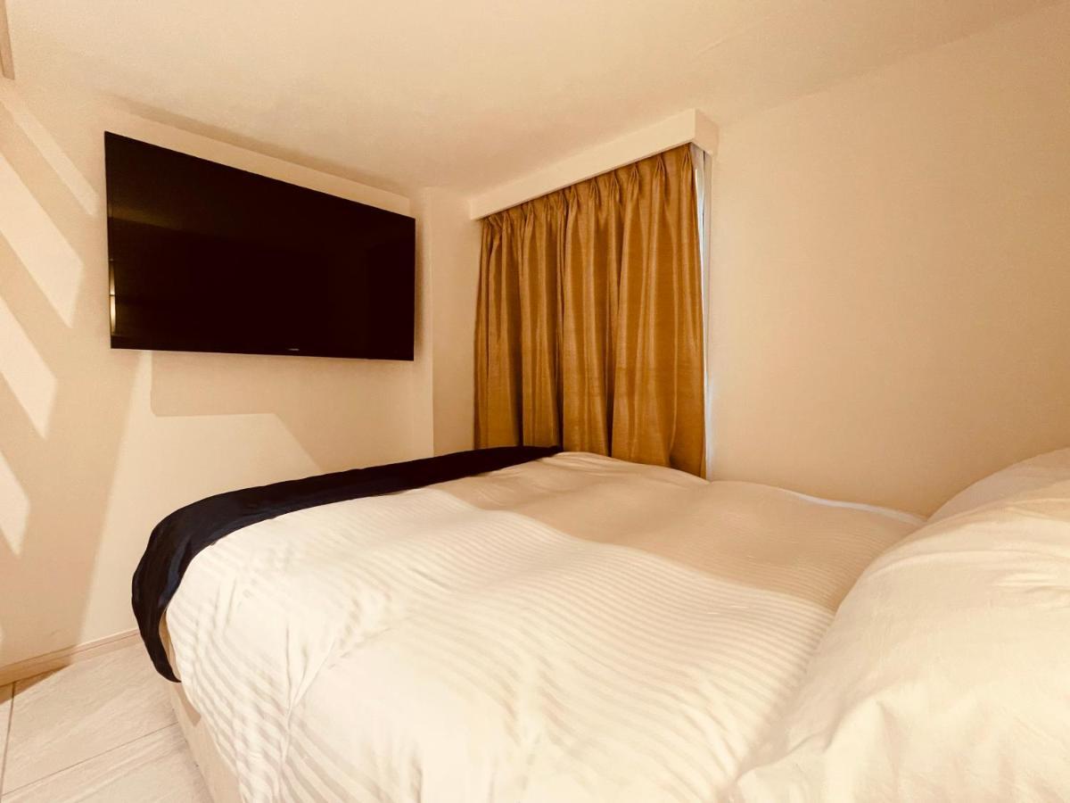 Phoenix Park Hotel Наго Екстериор снимка