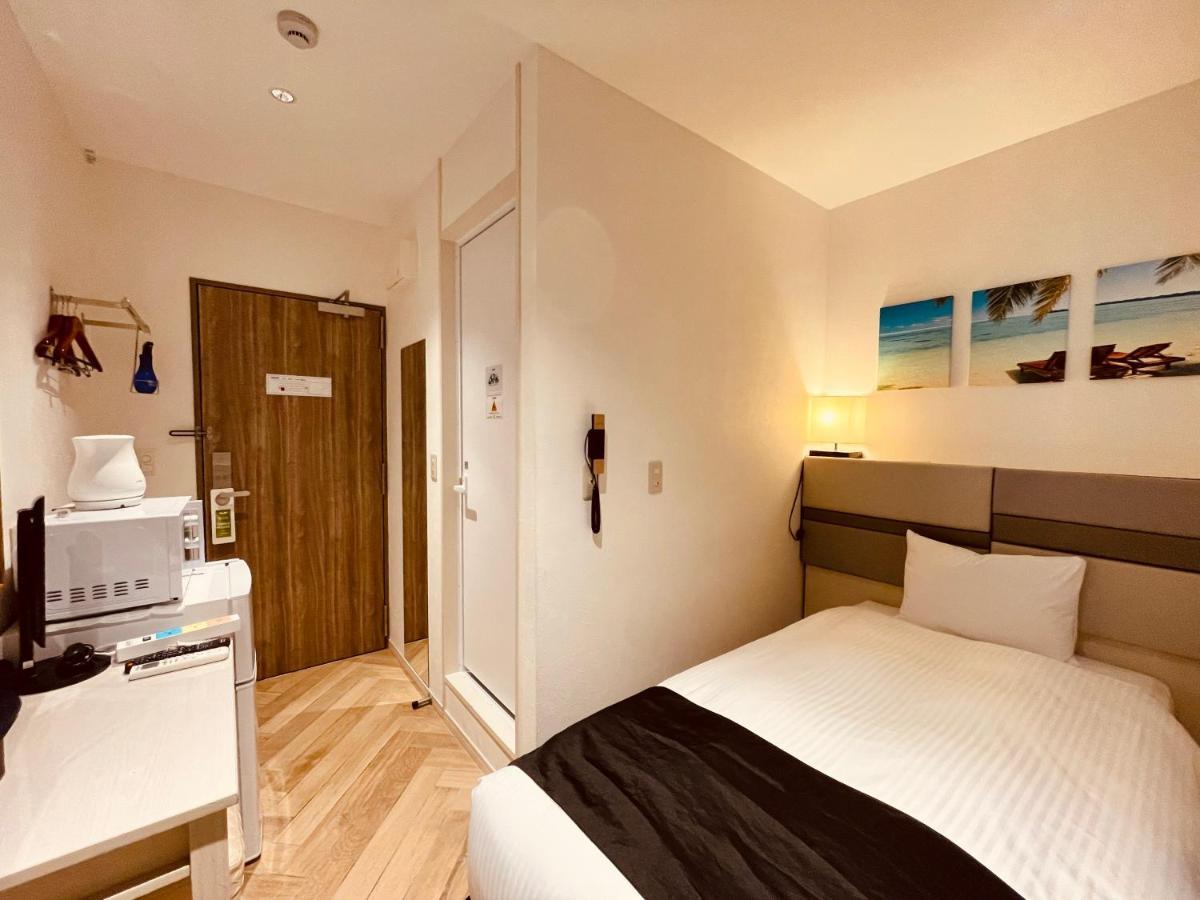 Phoenix Park Hotel Наго Екстериор снимка