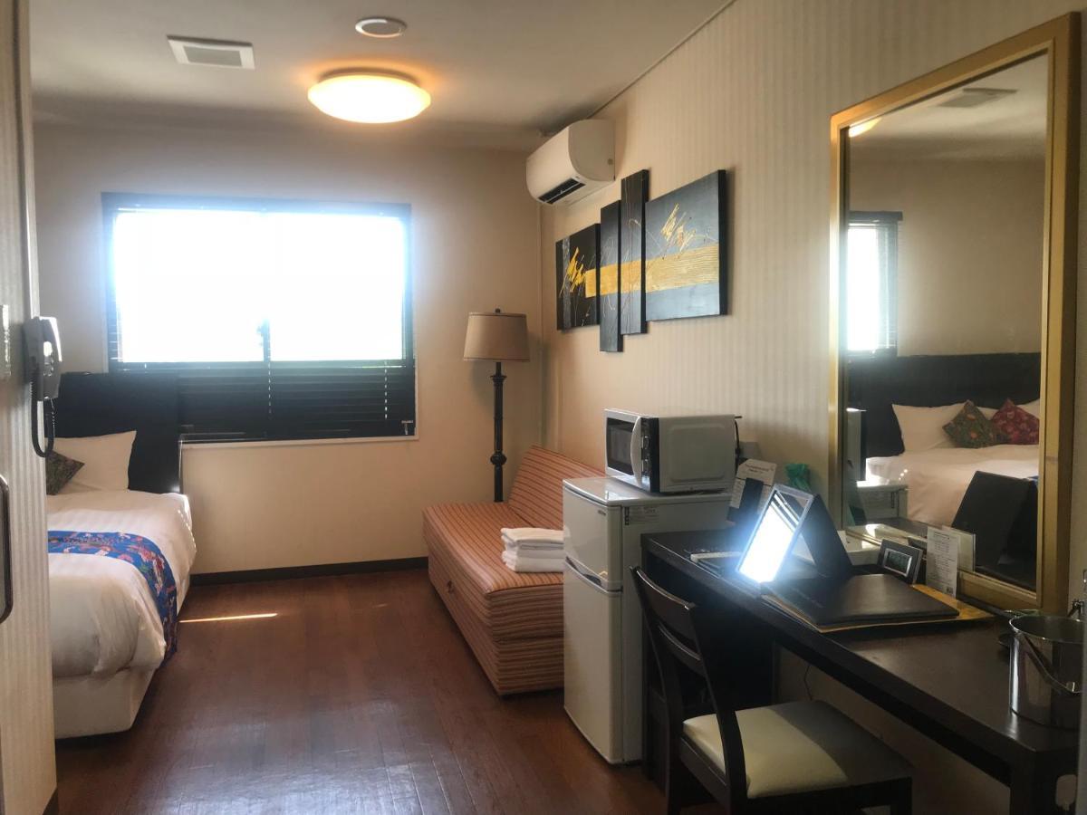 Phoenix Park Hotel Наго Екстериор снимка