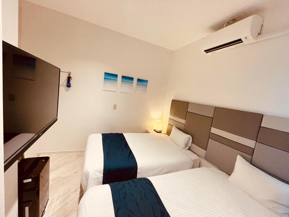 Phoenix Park Hotel Наго Екстериор снимка
